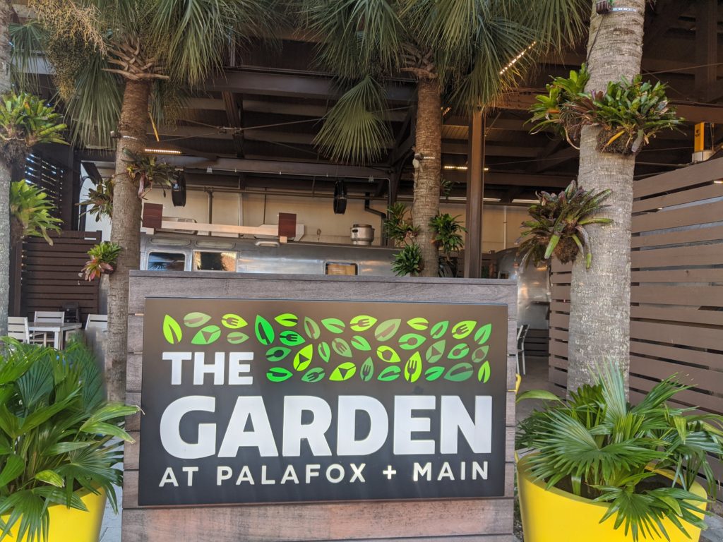 The Garden at Palafox + Main resturant sign