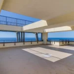 Large roof space with overhang above overlooking the ocean