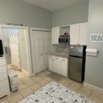 Bedroom suite with a kitchenette and bathroom