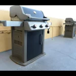 Two grills on a roof top space