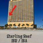 Hotel on a beach with a red arrow pointing to a room and the text "sterling Reef 1BR/1BA Unit 607"