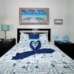 Smaller bedroom with swan towel decoration on top