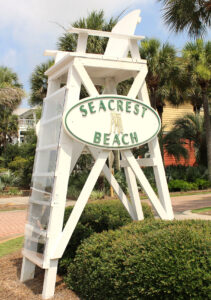 Lifeguard stand with a Seacrest beach sign